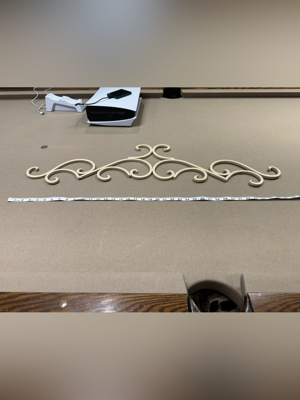 ornate, wrought iron scrollwork architectural pediment or wall accent piece